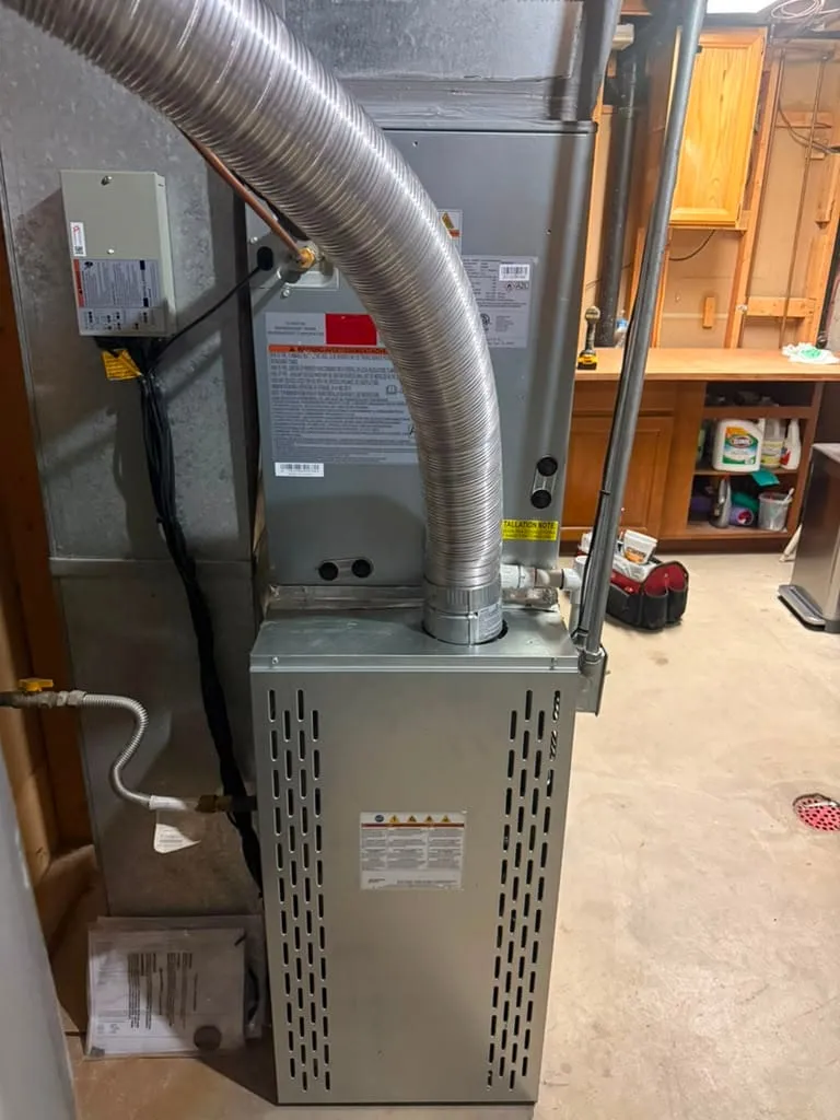 New 80 percent furnace and AC coil installed by Lucas Heating and Air in a West Valley City basement
