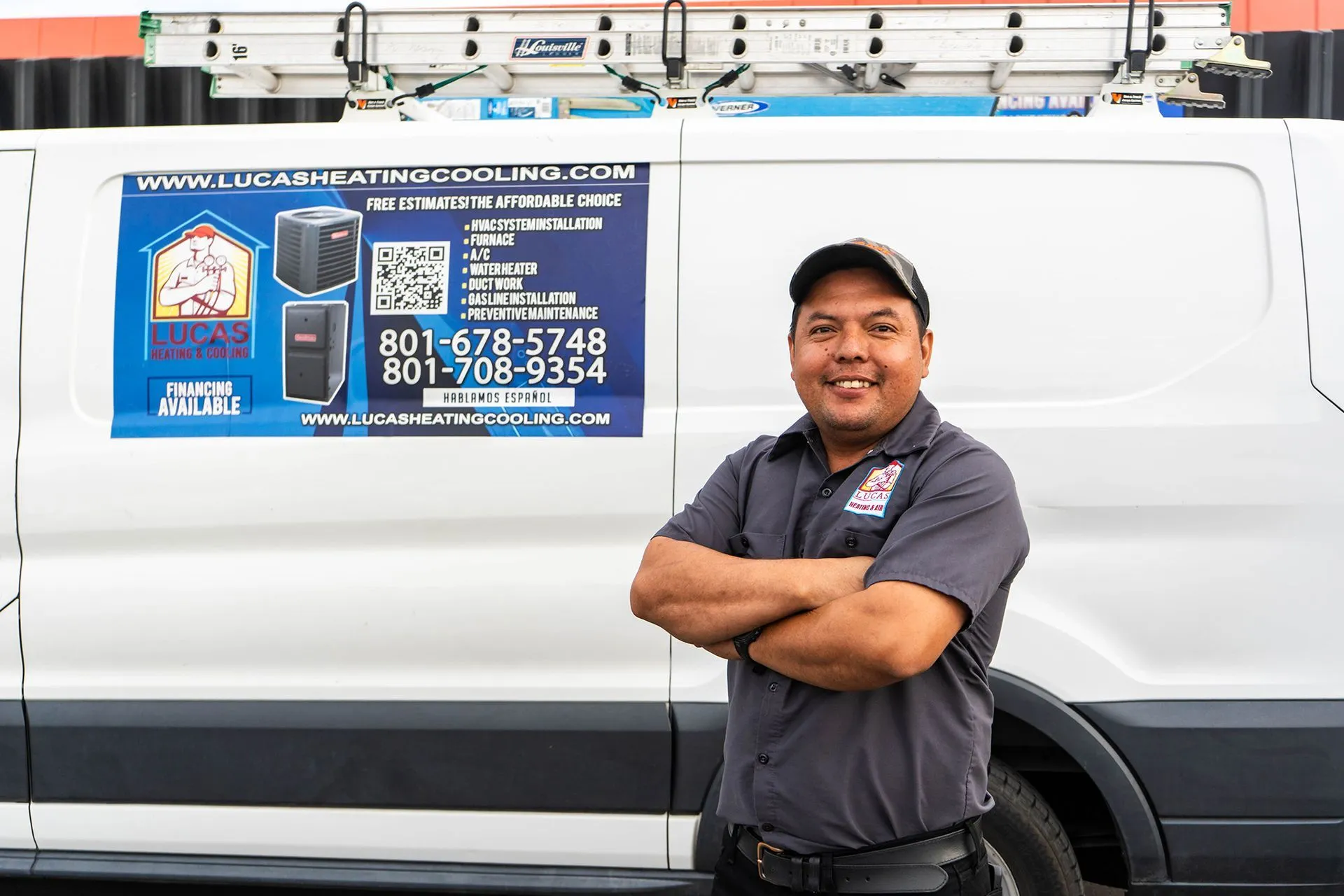 Lucas Heating and Air technician standing in front of a branded service van in Salt Lake City